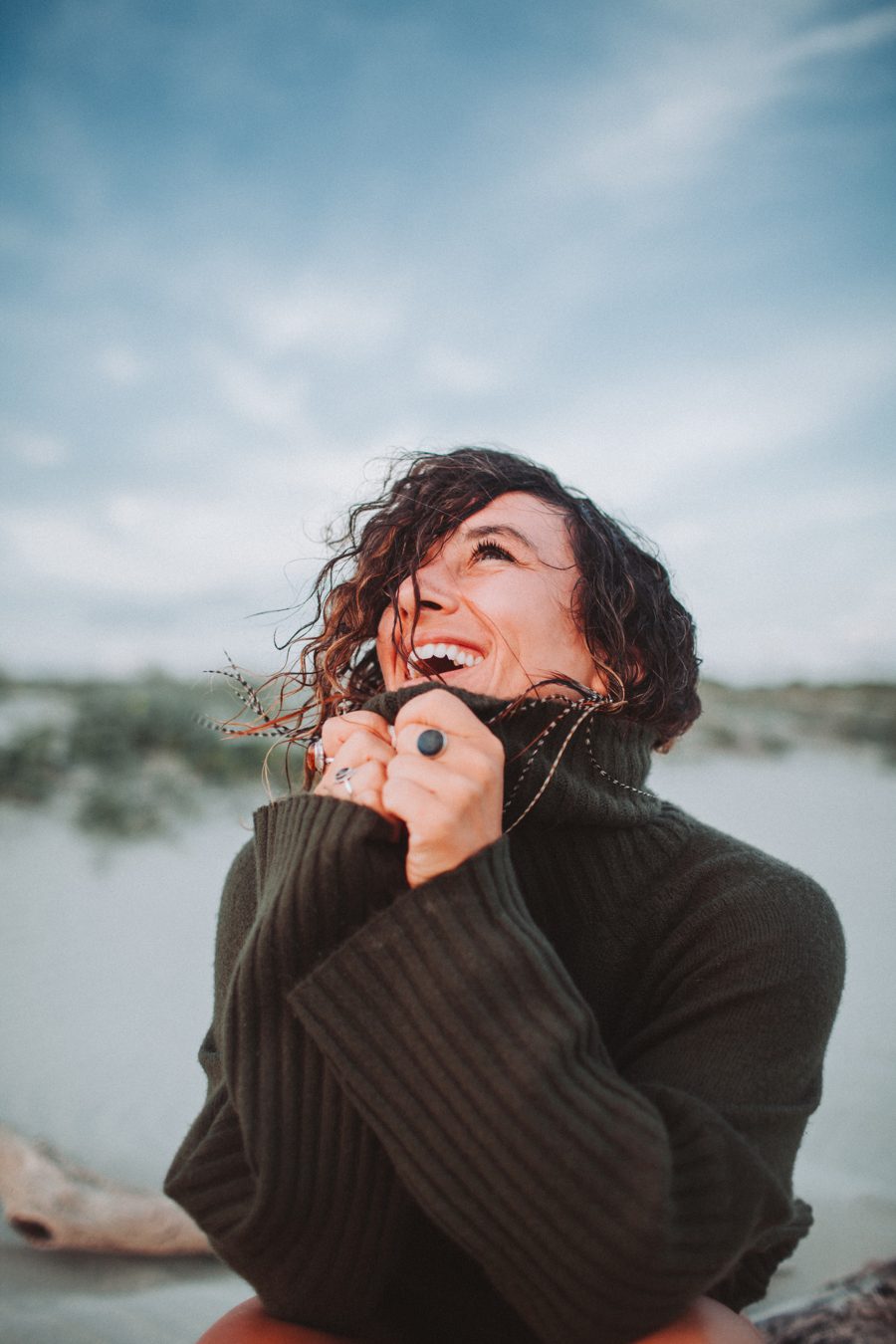 Dr. Kate Glebocki laughing, looking up at the sky